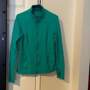 Green Kirkland fitness jacket